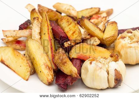 Oven Baked Potatoes, Beetroot, Celeriac And Garlic Bulbs