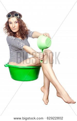 Girl Sitting In A Basin Rides.