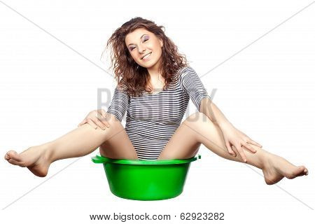 Girl Sitting In A Basin Rides.