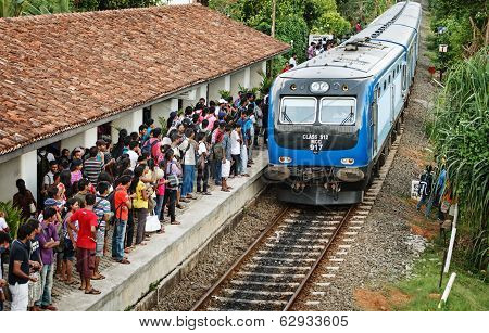 Bentota, Sri Lanka - 28 Apr 2013: Train Arrive To Station With Waiting People In Bentota, Sri Lanka.