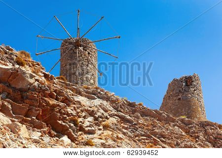 Old ruined windmills on the Crete. Lassithi region.  