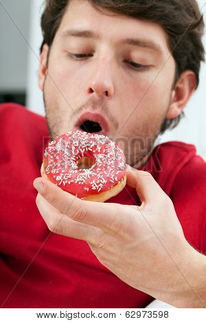Man Eating Donut