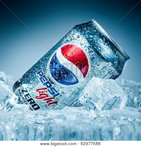MOSCOW, RUSSIA-APRIL 4, 2014: Can of Pepsi cola Lignt on ice. Pepsi is a carbonated soft drink that is produced and manufactured by PepsiCo. Created and developed in 1893.
