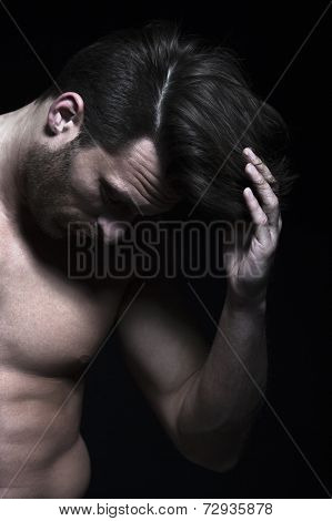 Handsome Man With Muscles With Hand In His Hair