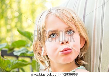 Pretty Little Girl With A Quizzical Look