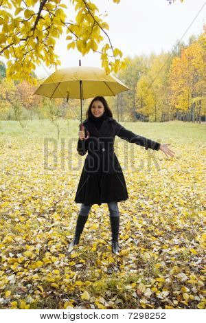Woman In Autumn Park