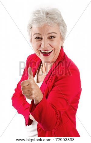 Happy senior businesswoman with thumbs up