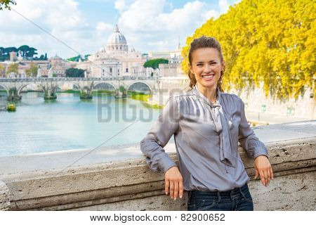Young Woman Standing On Bridge Ponte Umberto I With View On Basi