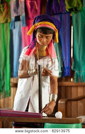 A Kayan Lahwi Oldest Woman Is Spinning.
