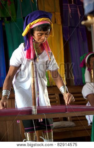 A Kayan Lahwi Oldest Woman Is Spninning.
