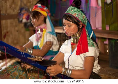 Two Kayan Lahwi Girls are Weaving.
