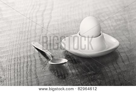 Egg In An Eggcup And A Spoon On A Table