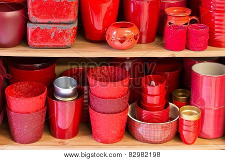 Red Flowerpots In The Florist Store