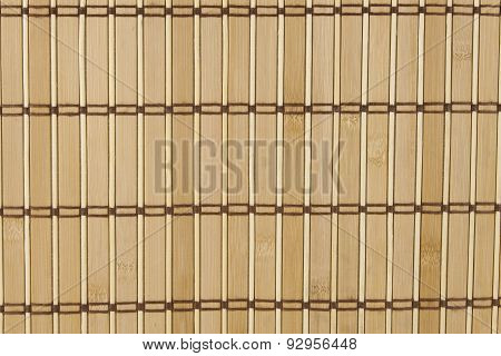 Bamboo mat as background. Detailed front view of the structure of a bamboo mat.