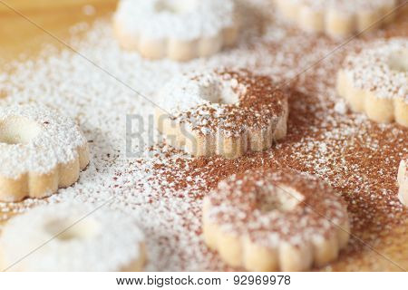 Italian Canestrelli Biscuits Covered With Powdered Sugar And Cocoa