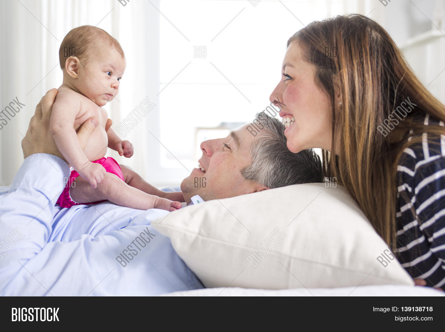 Two Parents Cuddling Image & Photo (Free Trial) Bigstock