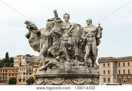 Sculpture at Vittorio Emanuele II Bridge Rome Italy.