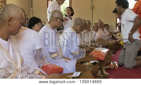 Man Who Will Become Buddhism Monk Sitting And Waiting For Ordination Ceremony