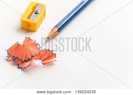 Pencil And Pencil Sharperner On White Background
