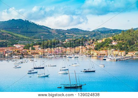Beautiful panoramic view over Porto Azzurro area at sunset, Italy