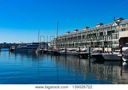 Woolloomooloo bay with historic Finger wharf which is the longest timbered-piled wharf in the world. Sydney Australia