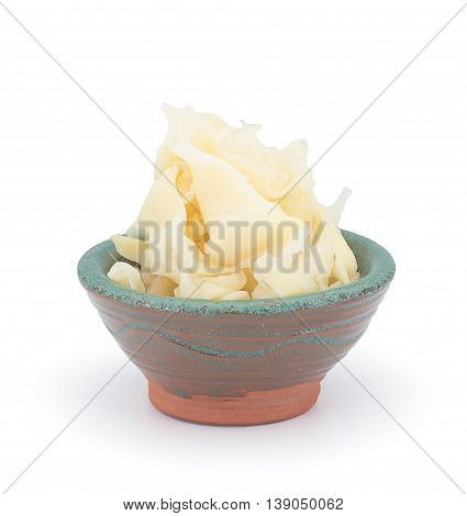 White Pickled Ginger In A Clay Sauce-boat Isolated On White Background