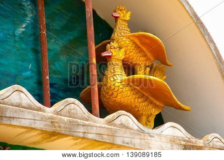 The Image Of Two Gold Birds. Pagoda In The Town Of Bago, Pegu. Myanmar. Burma.