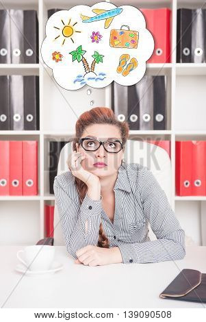 Bored Business Woman Dreaming About Holiday In Office