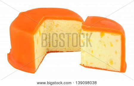 Orange wax covered mango and ginger Stilton cheese isolated on a white background