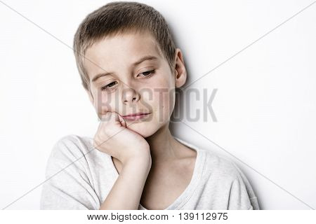 A stressed sad boy on studio bad time