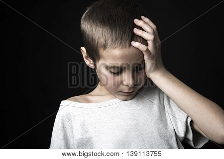 A stressed sad boy on studio bad time
