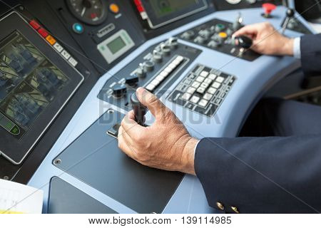 Railroad engineer. Train driver. A railroad engineer's workplace.