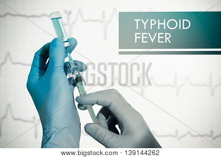 Stop typhoid fever. Syringe is filled with injection. Syringe and vaccine