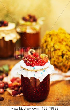 Homemade Strawberry Pits. Dessert Made Of Must And Flour Placed Inside Small Jars. Homemade Raspberr