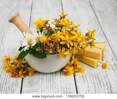 Tutsan Flowers  And Mortar With Soap