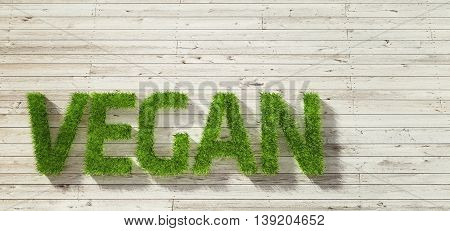 vegan made of grass on white wood background