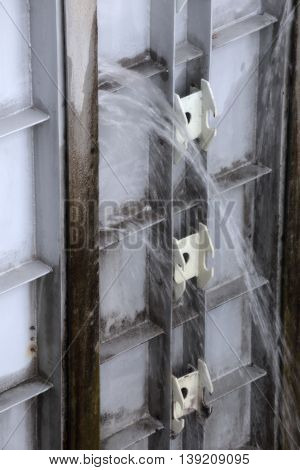Soft Shot Of Water Spraying Through A Leaky Watergate