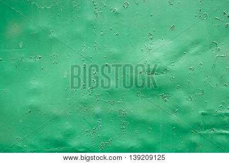 Green color metal plate background close up