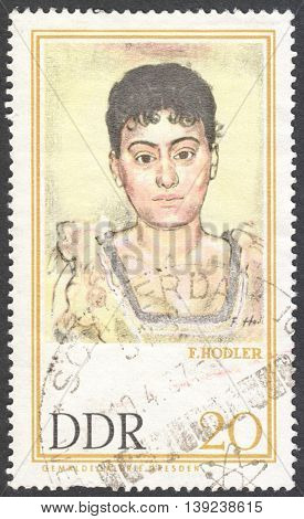 MOSCOW RUSSIA - CIRCA JANUARY 2016: a stamp printed in DDR shows Portrait of Madame de R. by Ferdinand Hodler the series 