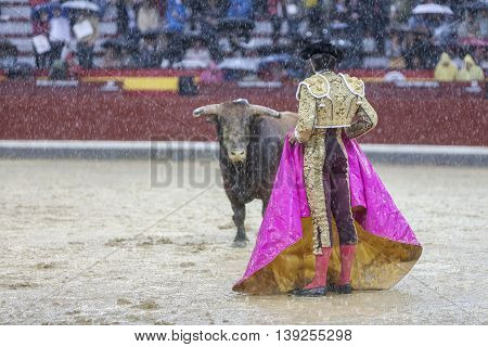 Jaen SPAIN - October 18 2008: The Spanish Bullfighter Sebastian Castella during a rainy afternoon bullfighting with the crutch in the Bullring of Jaen Spain