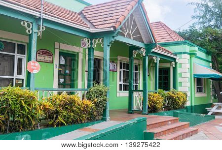 BRIDGETOWN, BARBADOS - NOV 2015 : Shopping district at Pelican Craft Centre, Bridgetown, Barbados. Opened in 1999, this marketplace offers restaurants, crafting demos, jewelry making sessions and local artisan shops for browsing.