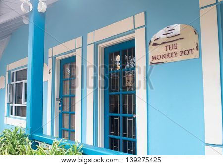 BRIDGETOWN, BARBADOS - NOV 2015 : Shopping district at Pelican Craft Centre, Bridgetown, Barbados. Opened in 1999, this marketplace offers restaurants, crafting demos, jewelry making sessions and such local artisan shops as "The Monkey Pot" for browsing.