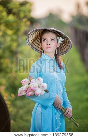 Asian Office Woman, Ao Dai Is Famous Traditional Costume For Woman In Vietnam