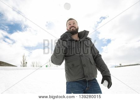 A Gorgeous young man looking outdoors in winter season
