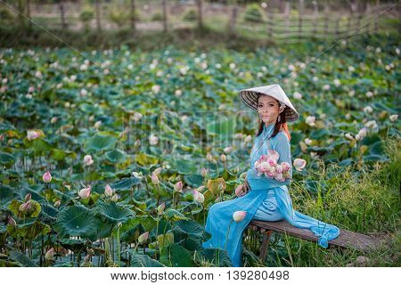 Asian Office Woman, Ao Dai Is Famous Traditional Costume For Woman In Vietnam
