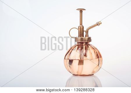 Vintage Perfume Bottle With Atomizer Isolated On White Background