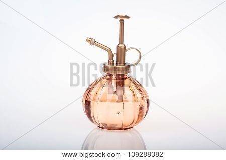 Vintage Perfume Bottle With Atomizer Isolated On White Background