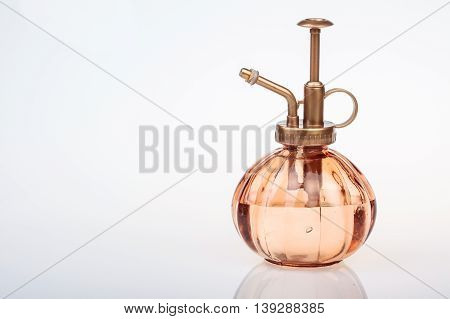 Vintage Perfume Bottle With Atomizer Isolated On White Background