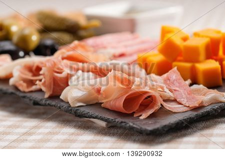 close up image of assorted cold cut platter