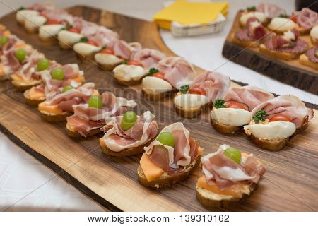 deliciously prepared ham and bacon sandwiches - closeup